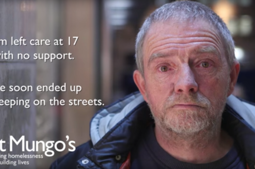 homeless man looking sad